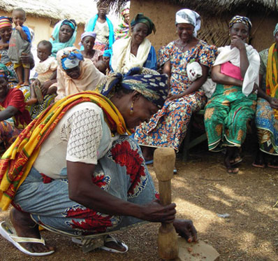 Photo: Woman making shea butter